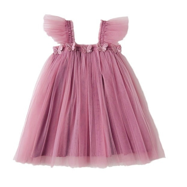 Pink tulle dress with floral details on a white background